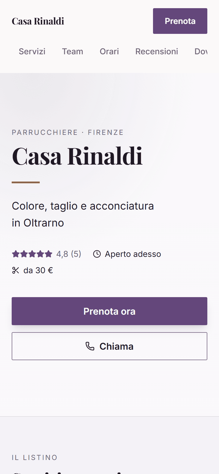 La vetrina di un parrucchiere fiorentino su fondo chiaro, con accenti color prugna e il listino che parte da 30 euro.